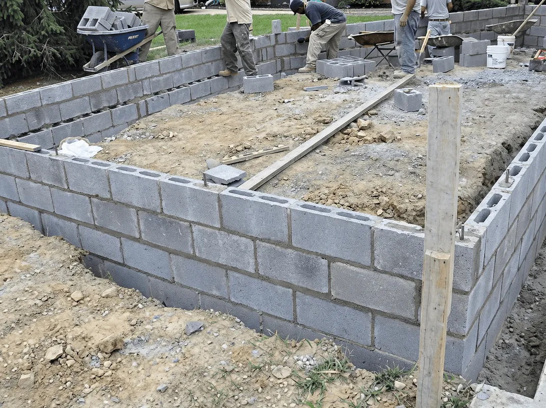 Professionals building a foundation with blocks in Philadelphia, PA